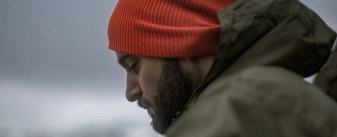 Person in quiet reflection considering what level of help they need for addiction recovery